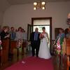 Brides March down the aisle. Father "giving Away" is actually "presenting of bride with family's blessing"