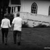 Bride and groom walking hand in hand